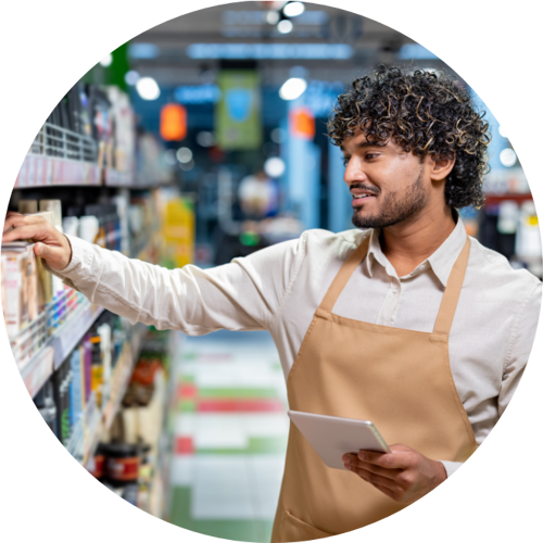 man stocking shelves in retail setting