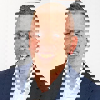 Adam Godson headshot