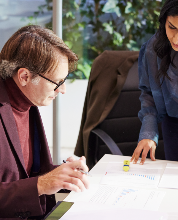 Two colleagues working at a table
