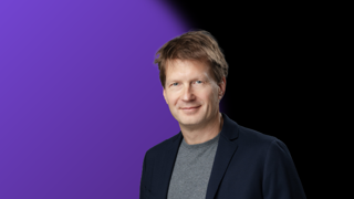 Felix Wetzel headshot on purple and black background