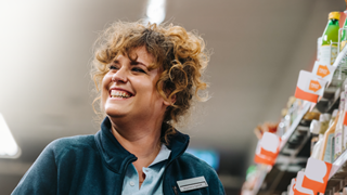 woman smiling in retail setting